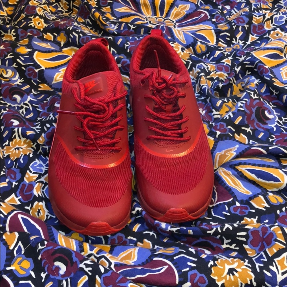 Red Nike Thea.